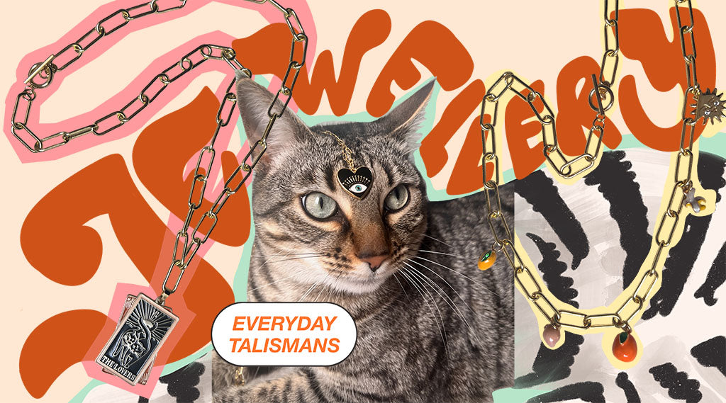 Tabby cat surrounded by colorful illustrated chains and text reading "everyday talismans" on an abstract background.