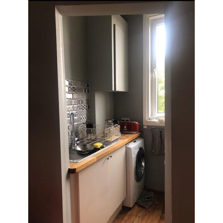 Image of Cabinetry-Building-Window-Countertop-Wood-Interior design-Kitchen-Floor-Hardwood-647909827347282