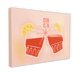 The Cin Cin Matte Canvas Print by Hôtel Dodo showcases two stylized glasses of red beverage with lemon slices, with the text "CIN CIN" above. The light peach background enhances the zesty retro print vibe, reminiscent of Hôtel Dodo's tropical foliage decor.