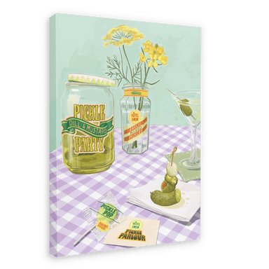 Illustration of a pickle-themed party setup featuring the Pickle Party Giclée Canvas Print by Hôtel Dodo, with pickles in jars, yellow flowers in a vase, a pickle lollipop centerpiece, and party signage from Hôtel Dodo, all arranged on a purple checkered tablecloth.