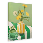The Matcha Mornings Giclée Canvas Print by Hôtel Dodo portrays a green tea cup, a teabag, and a vase with yellow dandelions on a green and white striped tablecloth, evoking serene mornings.