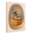 The Grumpy Spiced Pumpkin Giclée Canvas Print by Kitsch Kanaveral features an illustration of a witchy rain frog wearing a witch hat, sitting on a carved pumpkin with a grumpy face. The image captures autumn vibes and is set within an ornate oval frame.