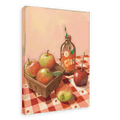 Hôtel Dodo’s “Apple Core Giclée Canvas Print” features a charming scene of apples in a carton, a glass bottle of fresh cider with a straw, a toffee candy apple, and a loose apple, all arranged on a red-checkered tablecloth set against a light pink background.