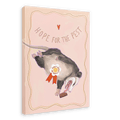 The "Hope For The Pest Matte Canvas Print" by International Pestsellers showcases an illustration of a possum with a ribbon that says "Don't Judge a Possum by its Cover" and the words "Hope for the Pest" above it, all set against a pink background.