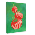 An artwork from Intercontinental Fruitery titled "Pomodori La Dolce Vita Giclée Canvas Print" features three red tomatoes stacked on a green background with the words "La Dolce Vita" written on them.