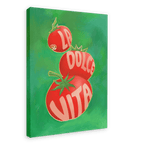 An artwork from Intercontinental Fruitery titled "Pomodori La Dolce Vita Giclée Canvas Print" features three red tomatoes stacked on a green background with the words "La Dolce Vita" written on them.