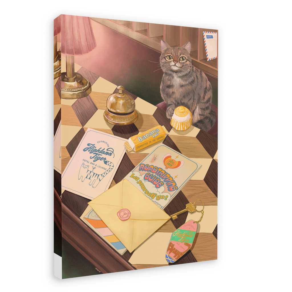 A Highland Tiger Lodge Giclée Canvas Print by Hôtel Dodo depicts a tabby cat seated on a checkered table surrounded by letters, a cupcake, a lamp, a bell jar, banana candy, postcards, and an envelope sealed with wax.