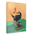 A toucan perches on a stack of poker chips, balancing dice on its beak and sitting next to an 8-ball in this Hôtel Dodo “Toucan Tables Giclée Canvas Print.”.