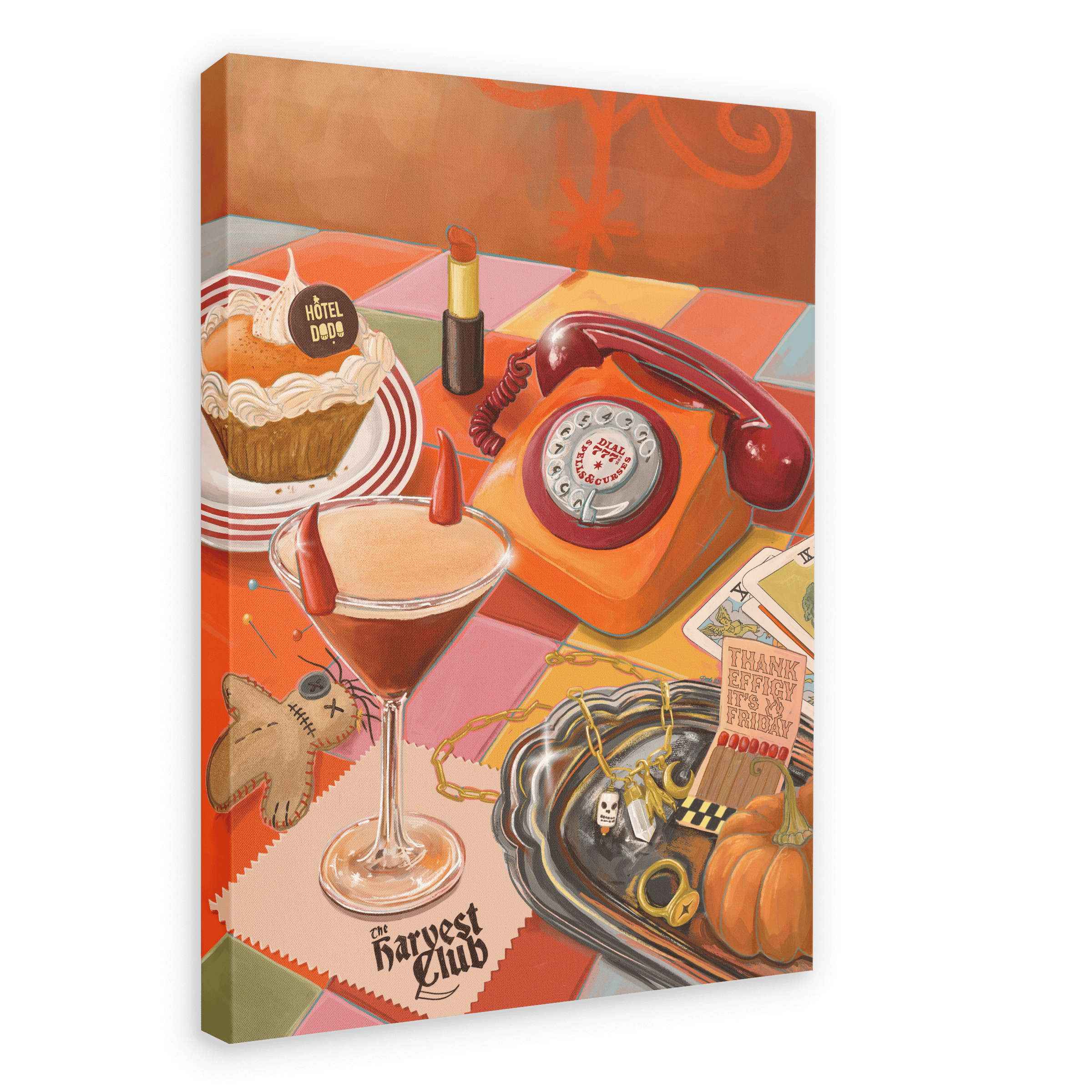 Experience the quirky spirit of spooky season with Hôtel Dodo’s The Harvest Club Giclée Canvas Print—a vibrant still life that features a horned cocktail, red rotary phone, cupcake, lipstick, keys, jewelry, voodoo doll, and a small pumpkin arranged on a patterned table with playful paranormal touches.