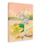 Bring a whimsical touch to your space with the “Butterlicious Giclée Canvas Print” by Hôtel Dodo, featuring a charming cow in a chef hat standing behind a butter box decorated with vintage butter curls and topped with caramel, surrounded by sliced bread, a knife, delicate flowers, and set against a picturesque country landscape.
