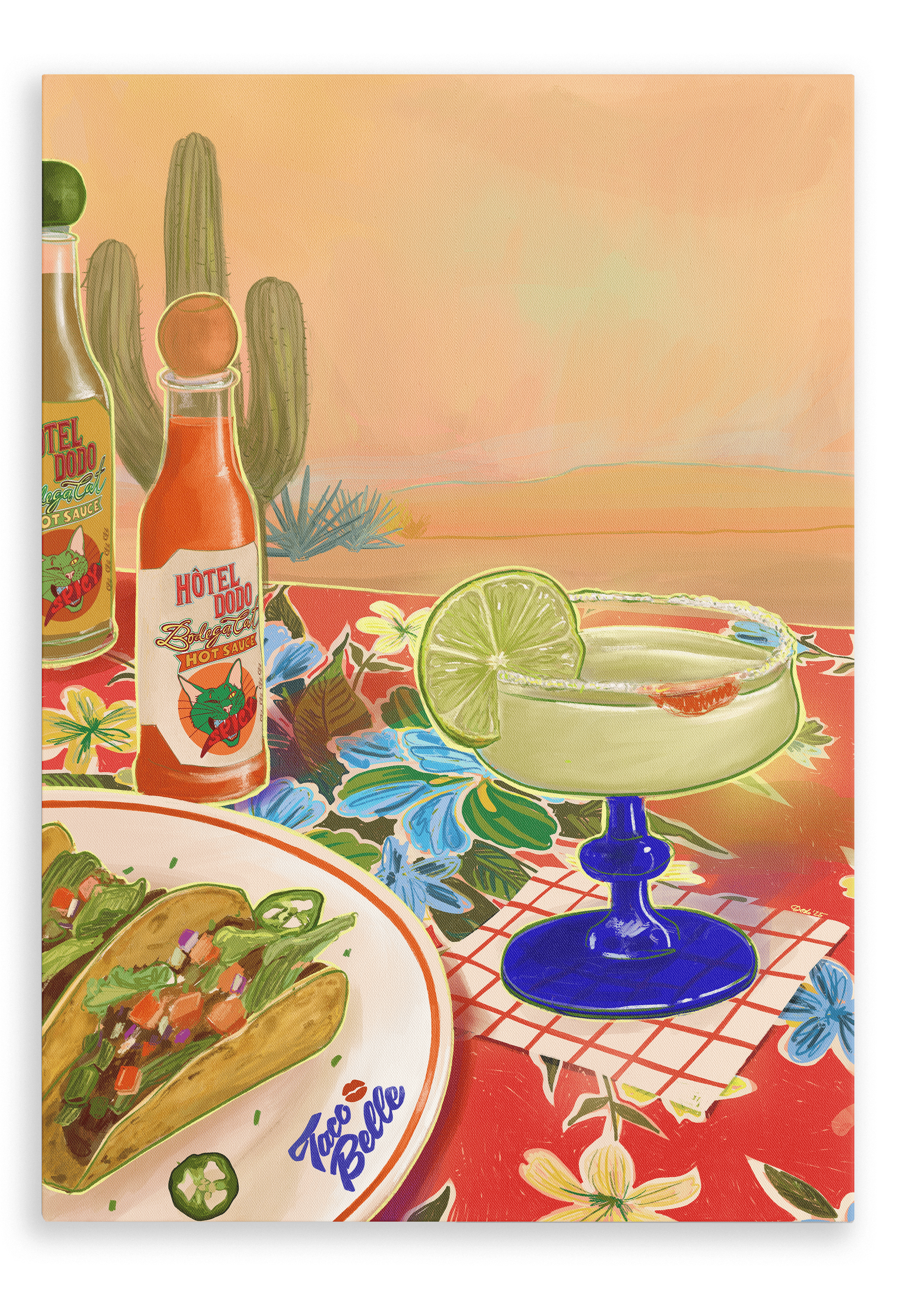 A zesty margarita with a lime slice, crunchy tacos on a plate, and bottles of Bodega Cat Hot Sauce are beautifully arranged on a floral tablecloth adorned with cacti and a vibrant desert landscape in the background, as depicted in the “Taco Belle Giclée Canvas Print” by Hôtel Dodo.