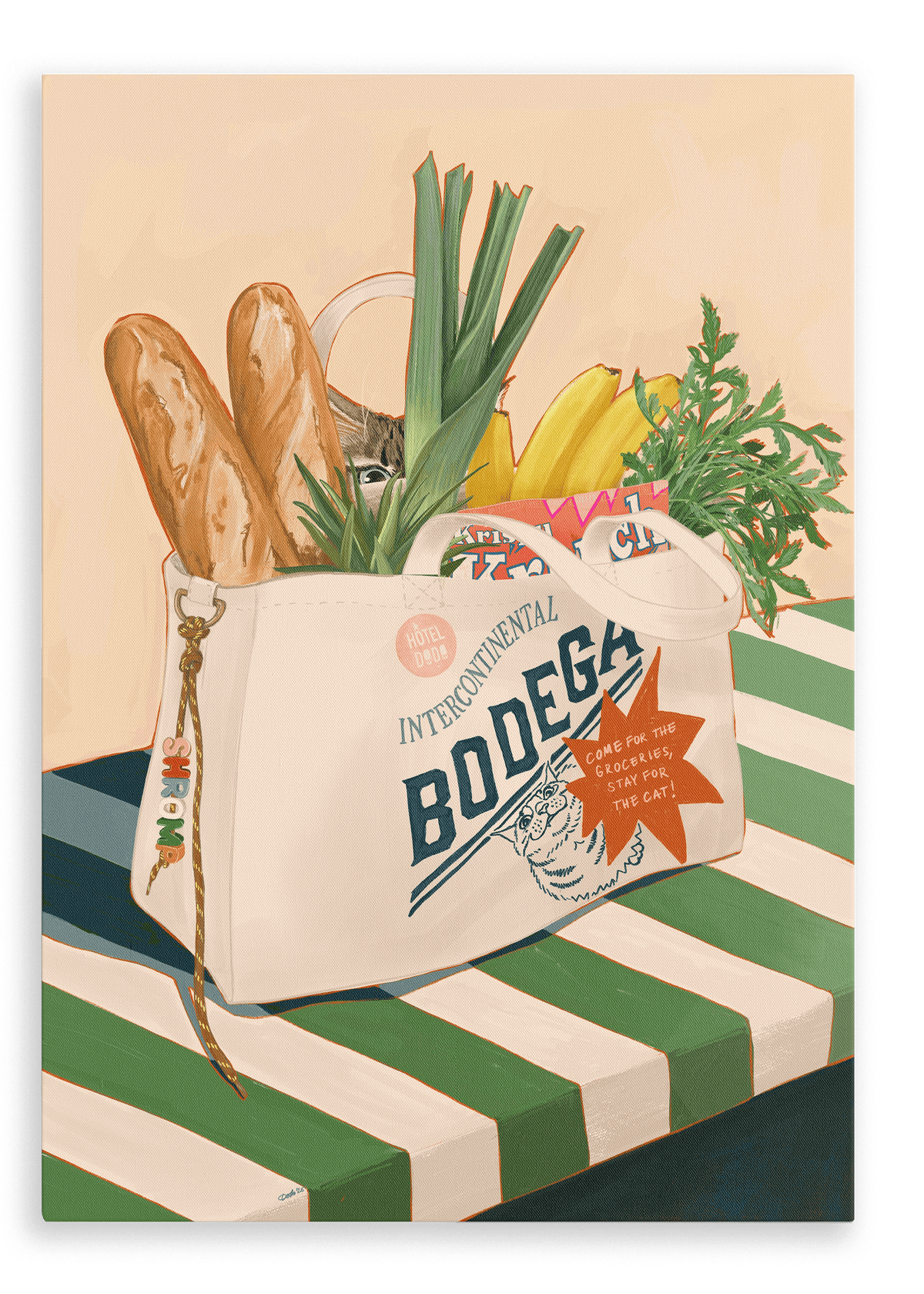 The Bodega Bounty Giclée Canvas Print by Hôtel Dodo depicts a canvas grocery bag, brimming with baguettes, leeks, carrots, bananas, and a can, resting on a striped table—while the curious face of a bodega cat peeks out from inside the bag.