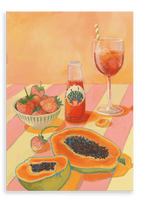 The L'Aperitivo Leopardo Giclée Canvas Print by Hôtel Dodo portrays a vibrant scene featuring a bowl of strawberries, cut papayas, a bottle labeled "Happy Friend Award," a vermouth drink with a striped straw, and a paper note on a striped table against an orange background.