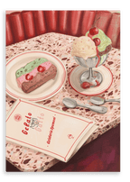 A Gelato Gatto Giclée Canvas Print by Hôtel Dodo is displayed on a terrazzo table alongside a layered ice cream dessert, a sundae glass with three scoops of ice cream and cherries, two spoons, and a menu.