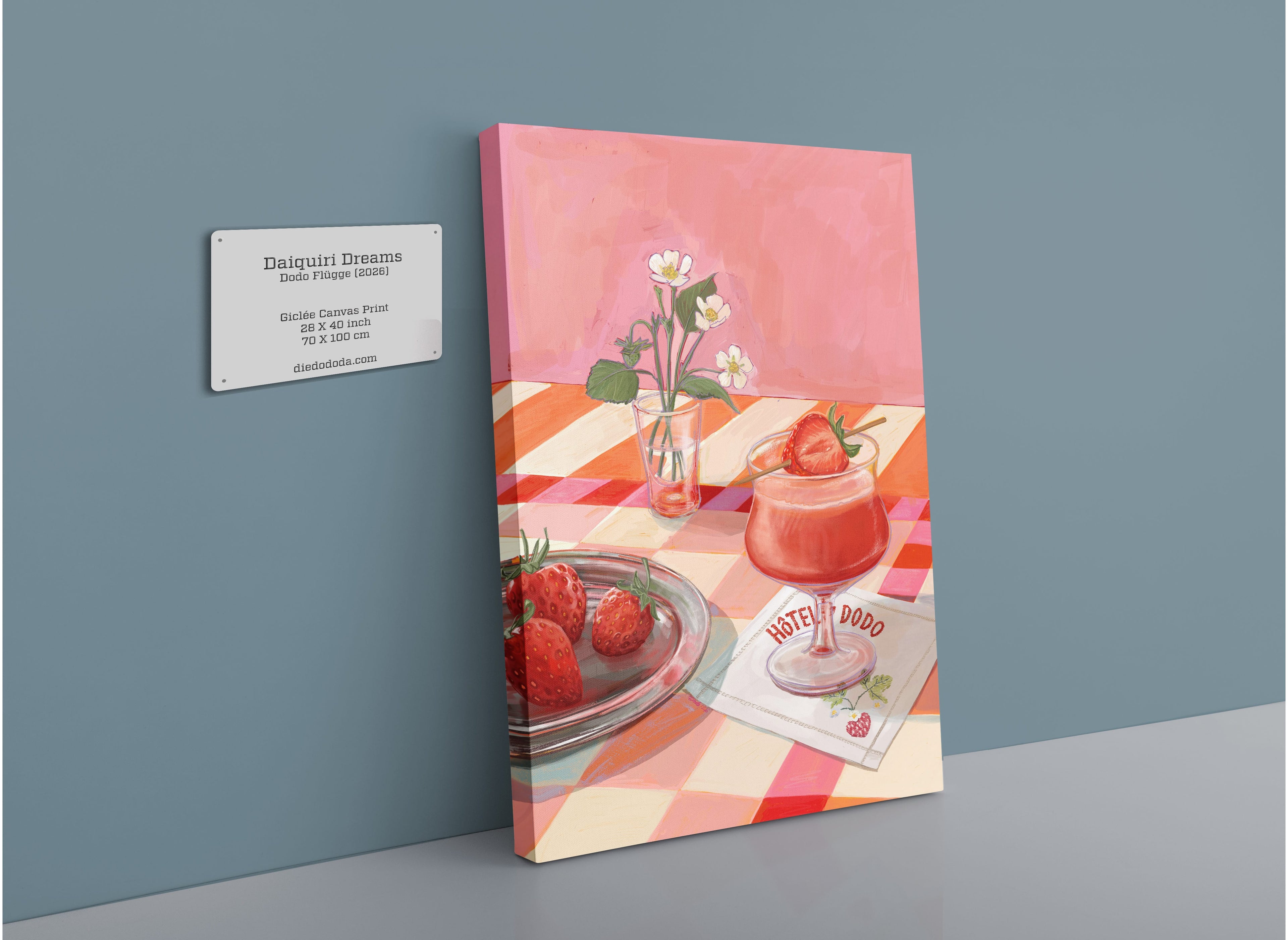 The Daiquiri Dreams Giclée Canvas Print by Hôtel Dodo features an artful arrangement of strawberries, strawberry cocktails, and flowers atop a checkered tablecloth, all set against a gray wall—a vibrant homage to the lively atmosphere of Hôtel Dodo.