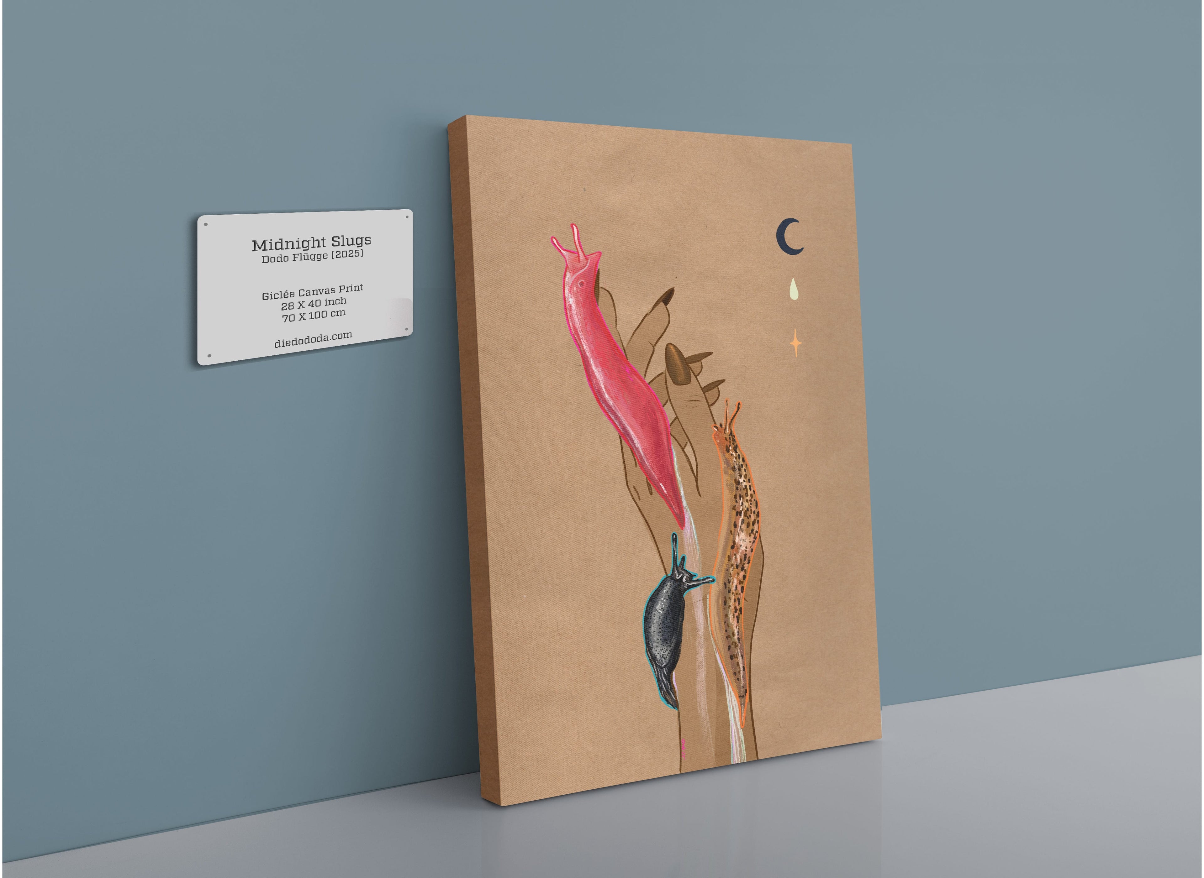 The Beauty and the Beastie Midnight Slugs Matte Canvas Print displays illustrated Black Arion and leopard slugs on a brown background, shown leaning against a blue wall beside a label with artwork details.
