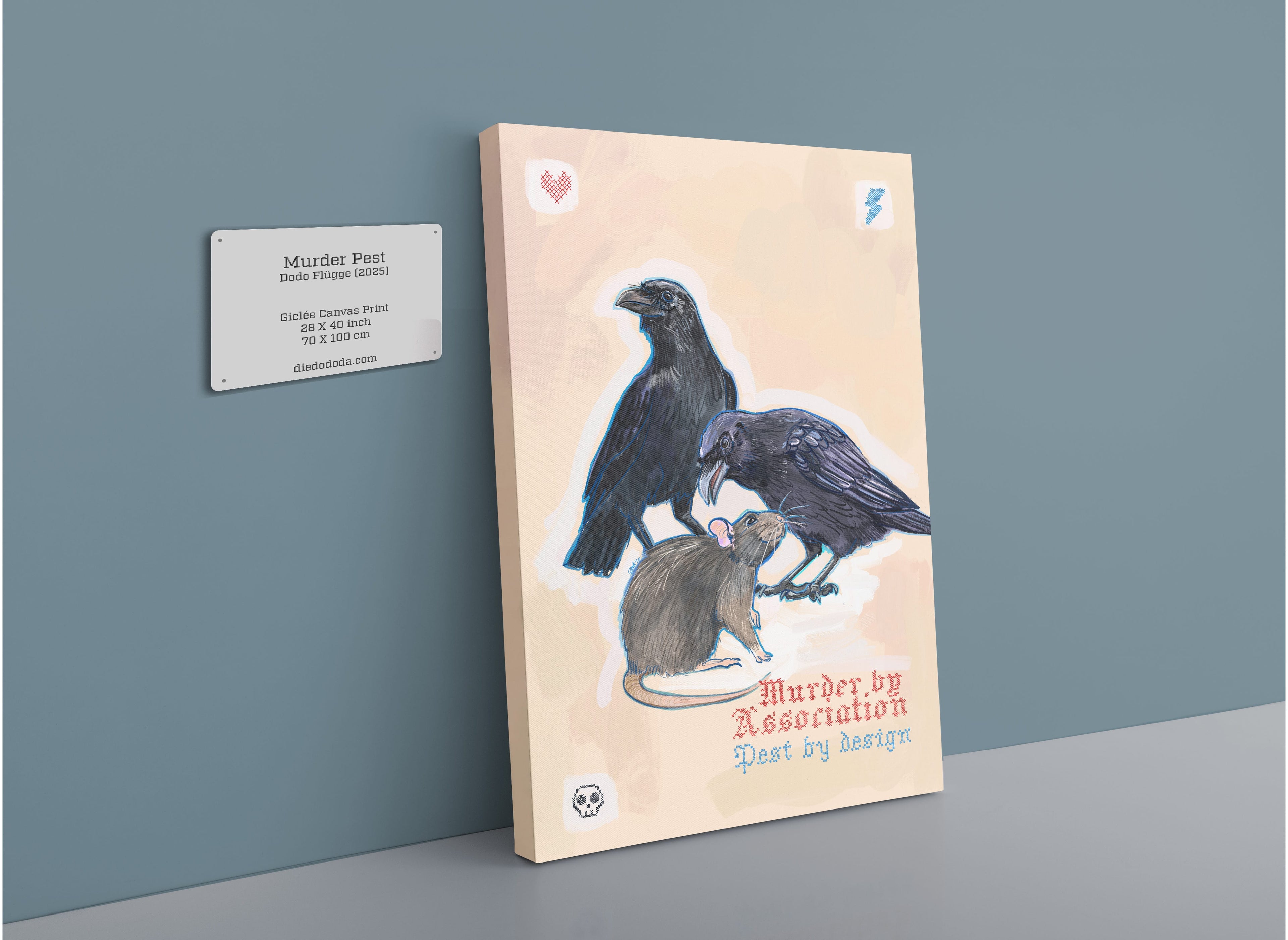 A matte canvas print by International Pestsellers, titled “Murder Pest,” hangs on a gray wall depicting two crows standing over a rat, accompanied by a plaque with artwork details and exploring themes of urban pests and intricate natural relationships.