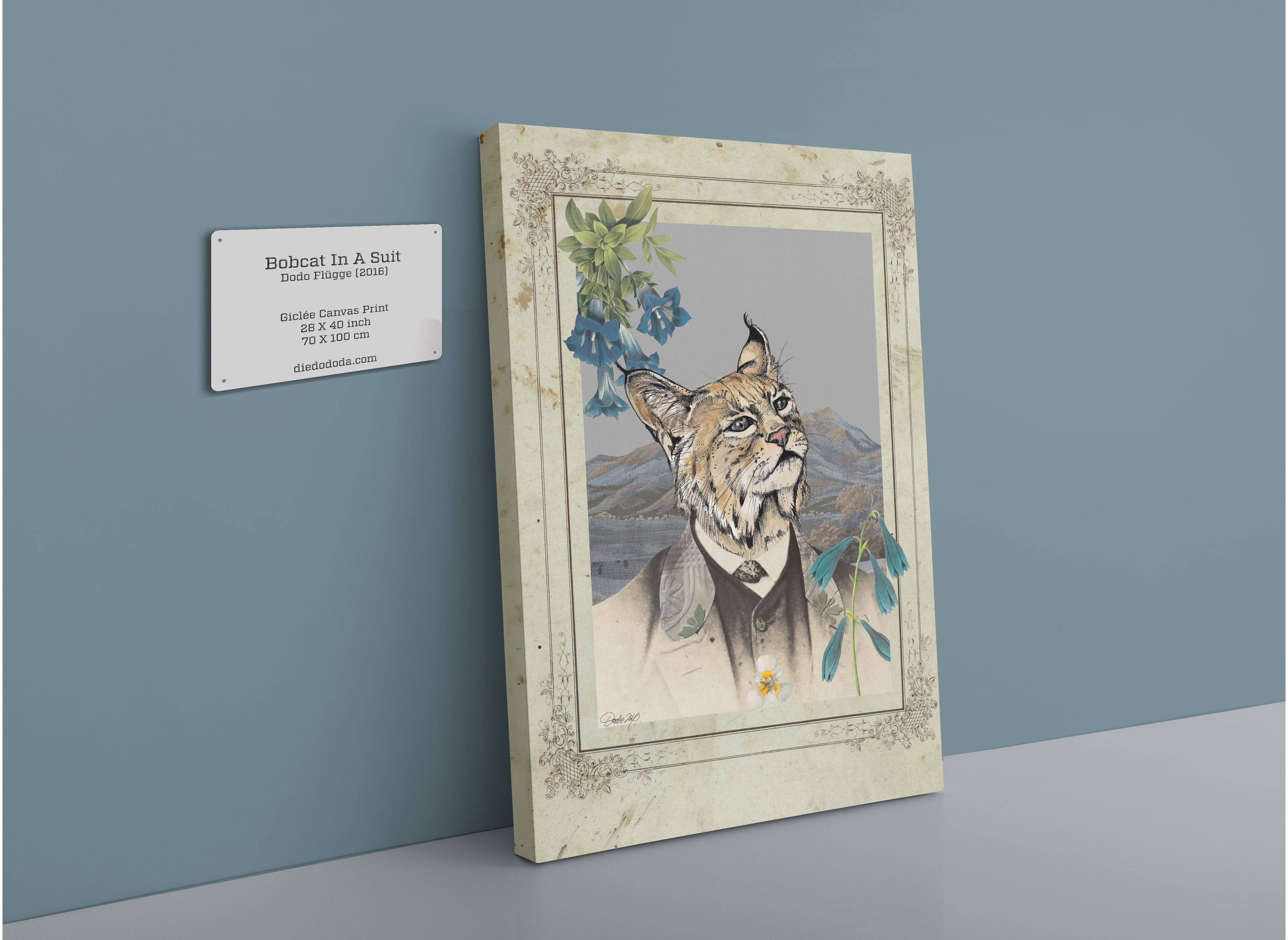 A Bobcat In A Suit Canvas Print from Animals In Suits is showcased on the wall beside a plaque displaying the artwork’s title and details, combining whimsical bobcat art with the elegant look of vintage botanical illustrations.