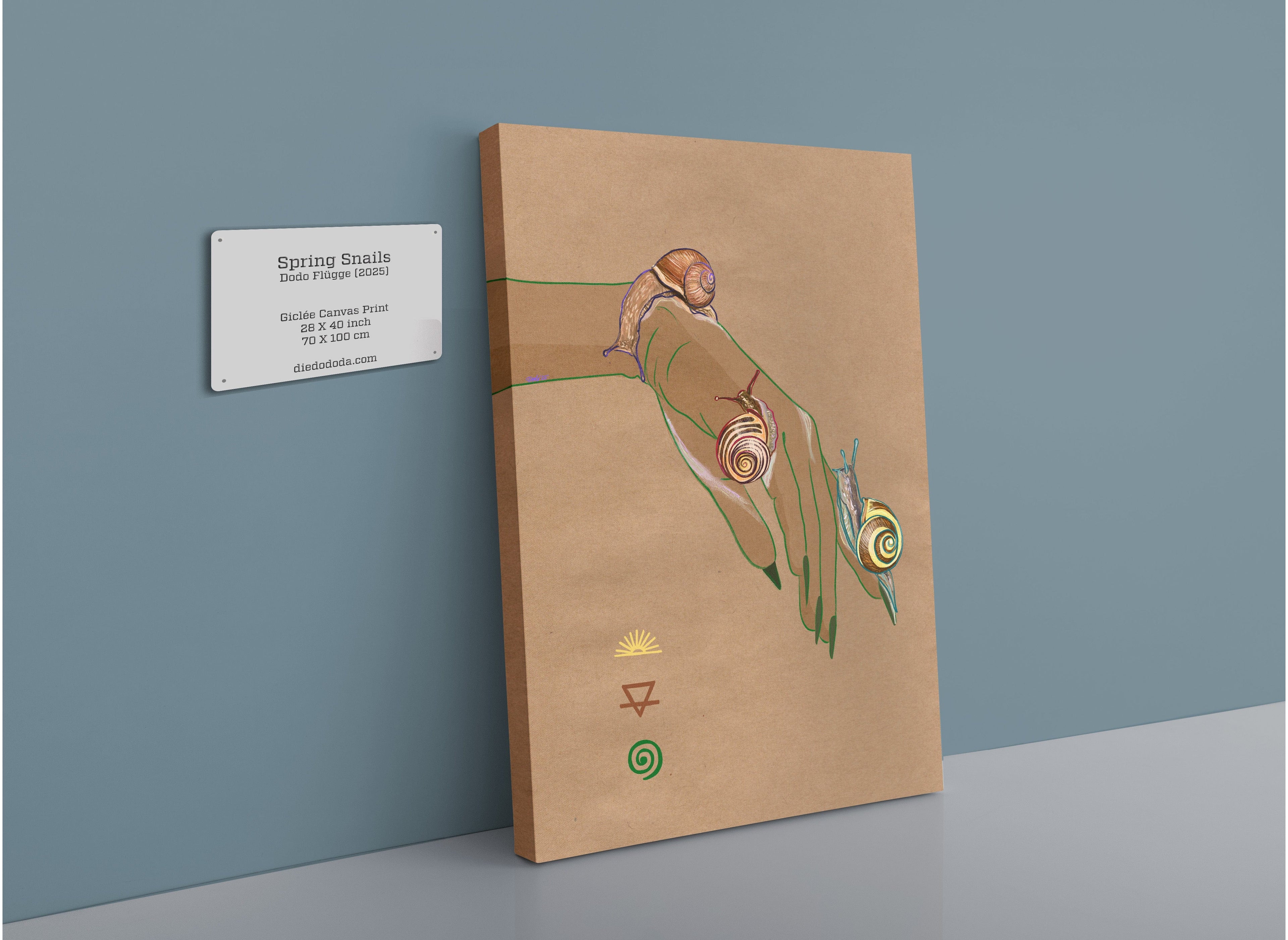 A canvas titled "Spring Snails Matte Canvas Print" from Beauty and the Beastie shows a hand cradling spiral-patterned snails, mounted on a wall with a label detailing the artwork's date and specifications.