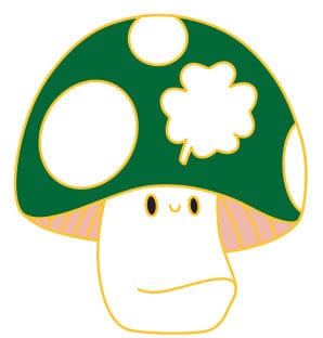 The Irish Luckshroom Pin by Pins by diedododa is a cartoon mushroom with a green cap, white spots, a white clover, and a simple smiling face on its stem.