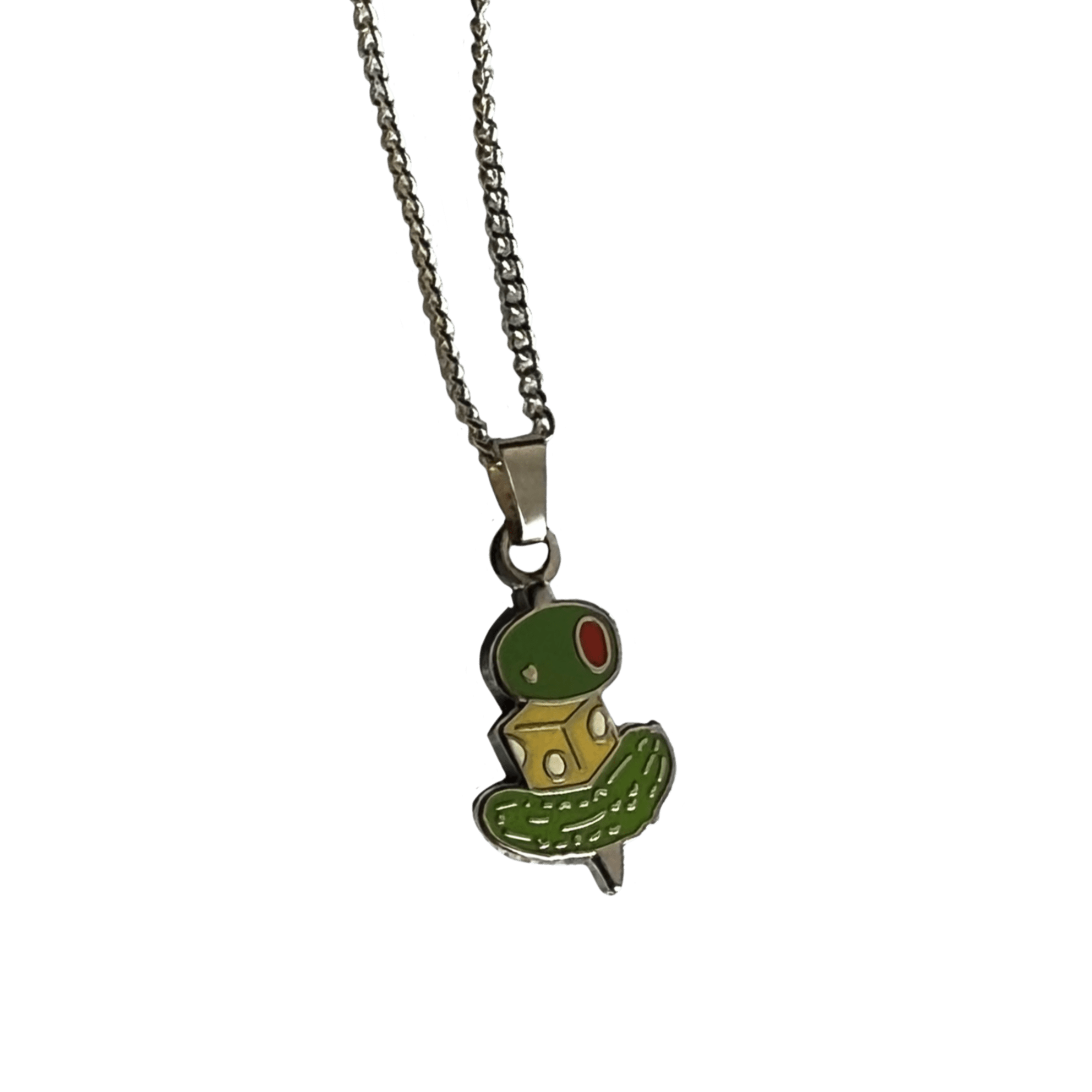 The Canapé Cutie Necklace by Necklaces showcases a whimsical canapé charm shaped like a green and yellow creature with red eyes.