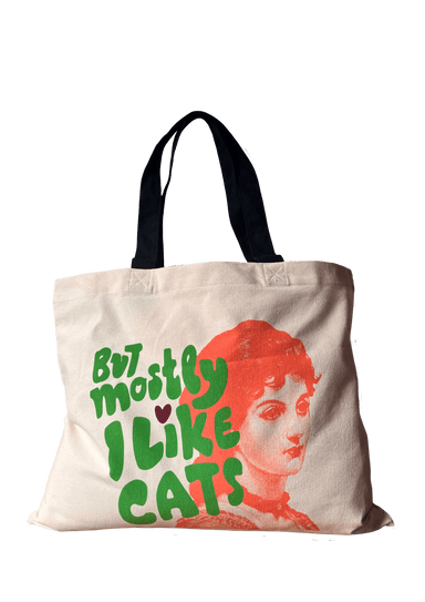 Tote bag by Bags by diedododa, featuring an orange-tinted image of a woman's face and green text reading "But mostly I like cats and snacks," called the But Mostly I Like Cats Shopping & Beach Bag.