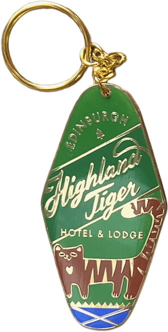 Show your love for the Highland Tiger Hotel with the Highland Tiger Hotel Keyring Dark by Essential Edinburgh—a stylish green and gold keyring featuring an illustrated tiger, mountains, and river alongside “Highland Tiger Hotel & Lodge Edinburgh” text. Perfect as a chic enamel bag charm or tag!.