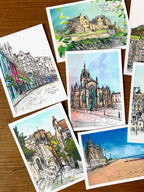 The Enchanting Edinburgh Mini Art Print Set by Essential Edinburgh features vibrant illustrations of iconic city landmarks, beautifully arranged—making it a perfect and unique souvenir gift.