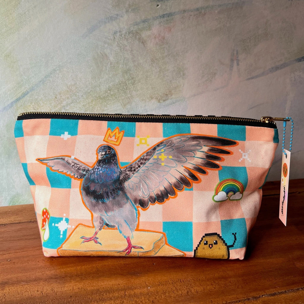 The Chaos Creatures Pouch by Aventures Des Créatures is a handmade UK cotton organiser with a zip and checkered pattern, featuring a crowned pigeon with outstretched wings, a rainbow, clouds, and whimsical illustrations.