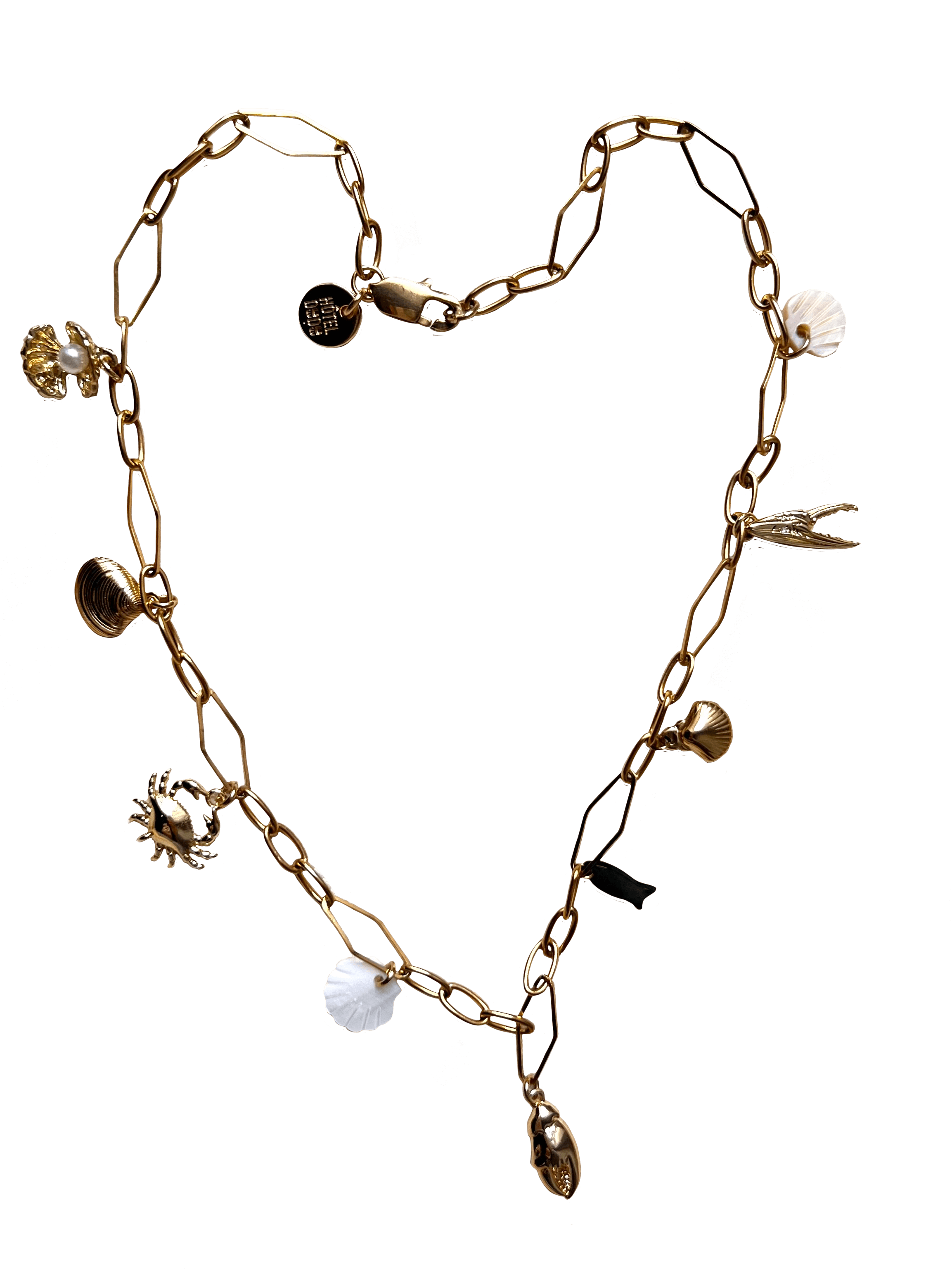 The Seaside Treasures Necklace by Necklaces features a gold-plated design with various charms, including seashells, insects, and other small trinkets, all arranged in a heart shape and secured with a lobster clasp.