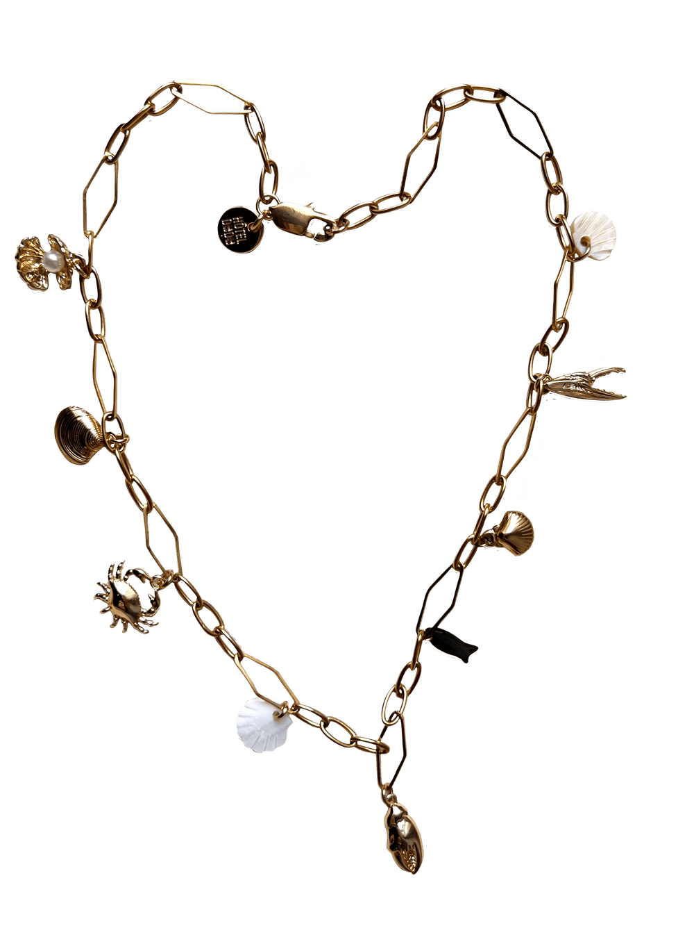 The Seaside Treasures Necklace by Necklaces features a gold-plated design with various charms, including seashells, insects, and other small trinkets, all arranged in a heart shape and secured with a lobster clasp.