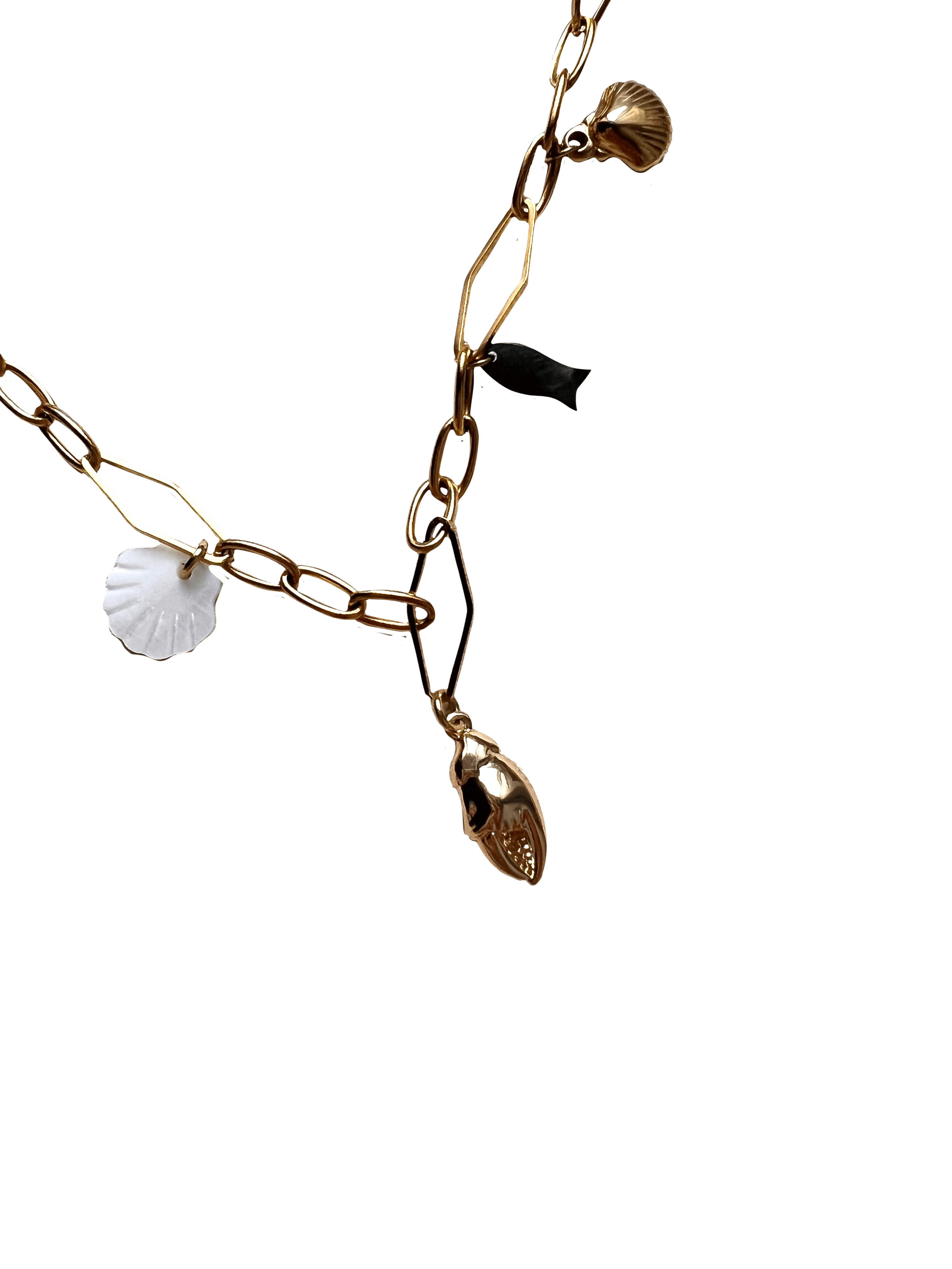 The Seaside Treasures Necklace by Necklaces features a gold chain adorned with seashell charms and a fish, secured with a reliable lobster clasp.