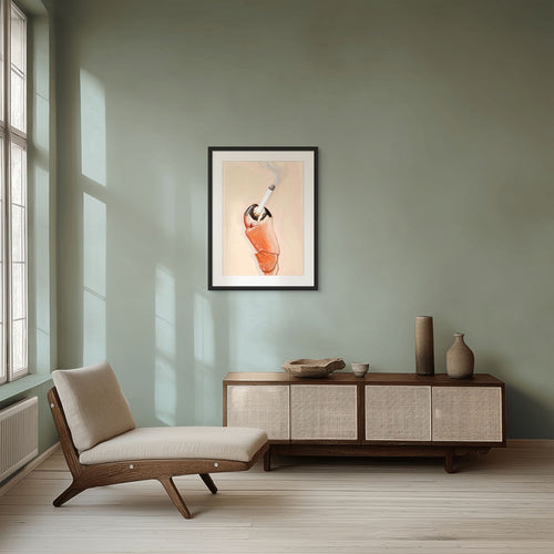 A minimalist living room features a lounge chair, sideboard, ceramic vases, and Kitsch Kanaveral's Smoked Crab Giclée Art Print depicting a Seafood Chomps cocktail with a straw on a pale green wall. Sunlight pours in from large windows.