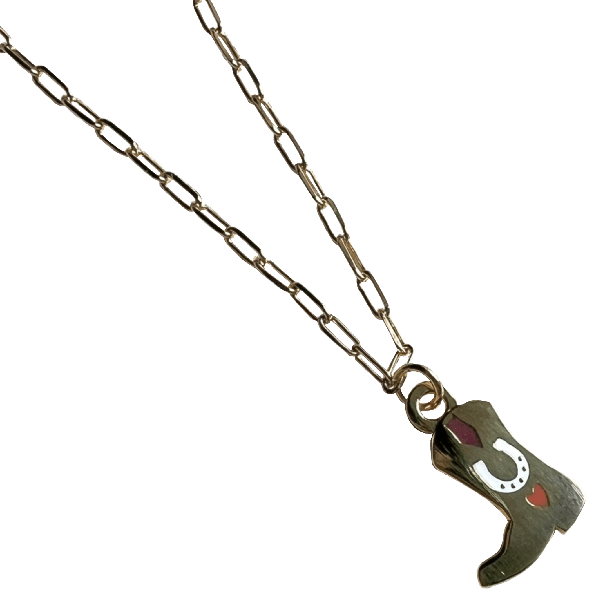 The Tiny Tootin Bootin Necklace by Necklaces is a silver paperclip necklace featuring a cowboy boots pendant, elegantly adorned with a horseshoe and heart design.