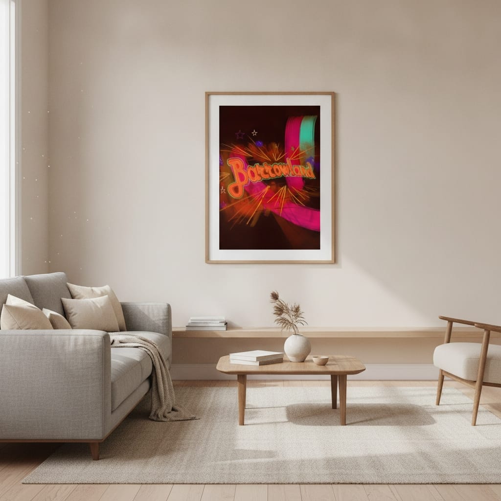 A modern living room with a light gray sofa, wooden coffee table, armchair, and the Barrowland Portrait Art Print by Glasgow Kisses—featuring the iconic neon sign—framed on the wall.