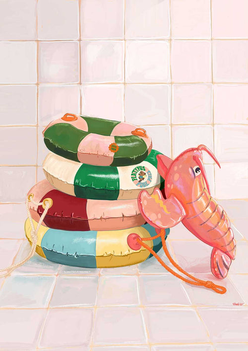 Three colorful inflatable pool rings are stacked on a tiled floor, with a pink lobster from Hôtel Dodo's Platypus Pool Pals Giclée Art Print leaning against them.