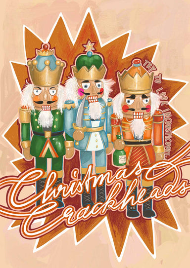 The "Christmas Crackheads" giclée art print from Kitsch Kanaveral features three cartoon nutcrackers with exaggerated eyes and expressions against a starburst background, accompanied by the message "Try to look productive.