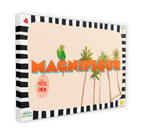 The Magnifique Matte Canvas Print by Hôtel Dodo showcases a colorful design with the word "Magnifique," featuring a parrot and palm trees amid lush tropical foliage in retro style. "Hôtel Dodo Resort" is elegantly displayed on a red tag integrated into the image.