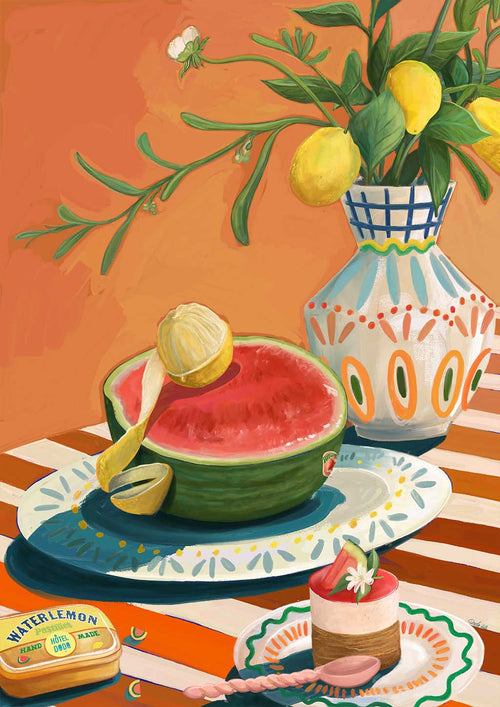 The Hôtel Dodo Watermelon Giclée Art Print by Hôtel Dodo features a watermelon half topped with lemon on a patterned plate, accompanied by cake, a “waterlemon” tin, and lemons—an inviting scene for a Mediterranean-style luxury picnic.